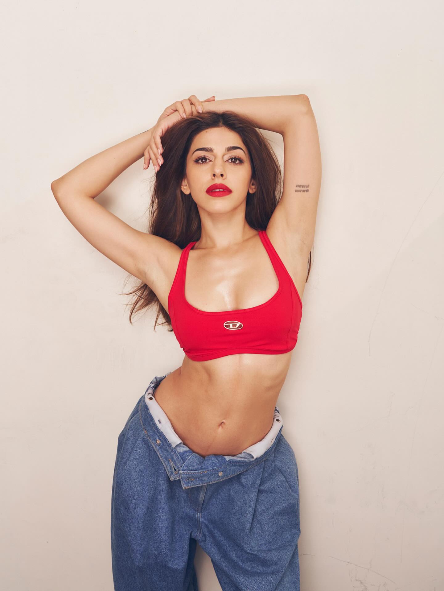 Alaya F Exudes Gen-Z Glamour in Crimson Crop Top and Baggy Denim
