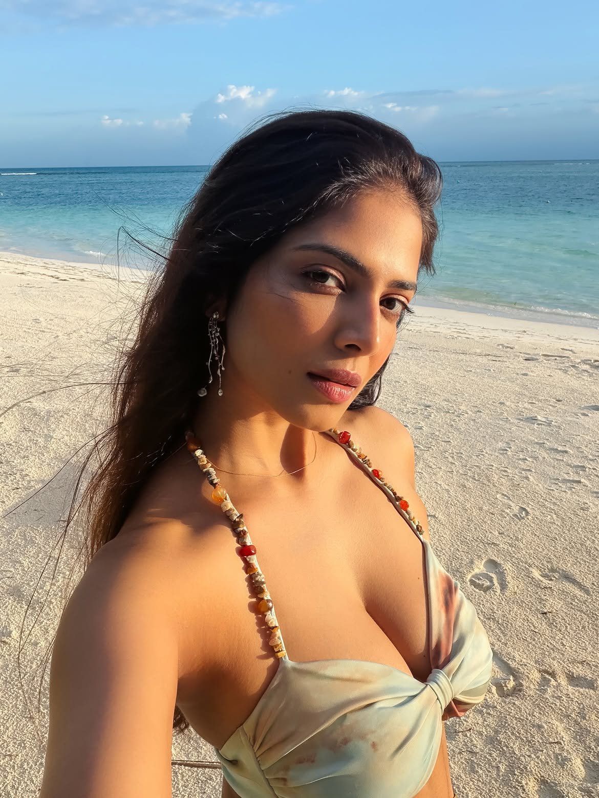 Malavika Mohanan Sets the Beach on Fire in an Elegant Printed Bikini and Sheer Sarong Look